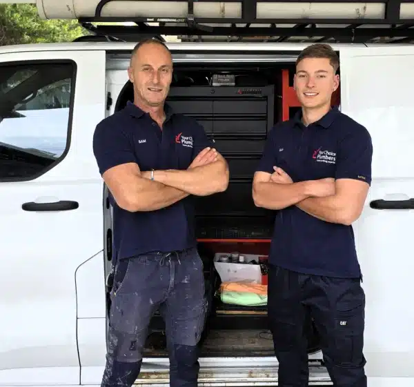 Sam and Aidan from Your Choice Plumbers standing beside their plumbing van providing residential plumbing services across Melbourne.