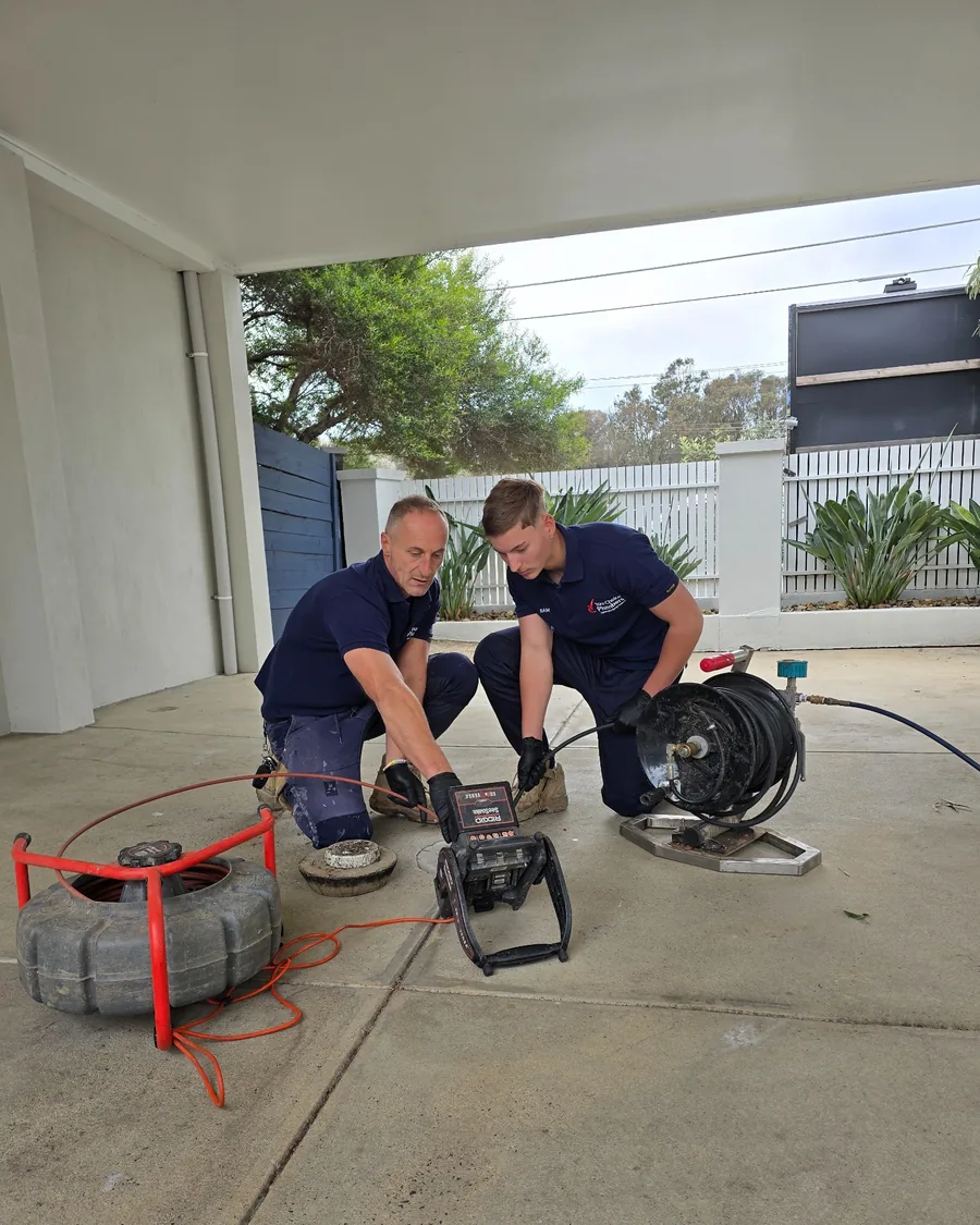 Your Choice Plumbers plumbers carrying out CCTV drain inspection and high-pressure hydro jetting at a client’s property.